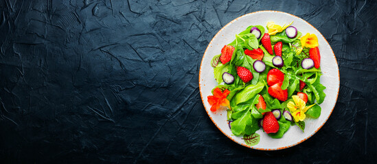 Summer salad with berries and herbs