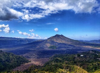 Fototapeta premium kintamani volcano view with clouds and mountains at bali indonesia
