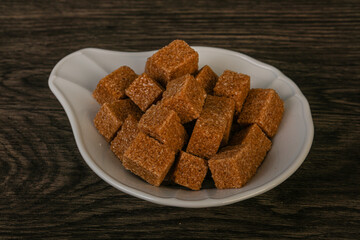 Cane sugar cubs in the bowl