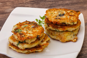 Zucchini pancakes with herbs and spices
