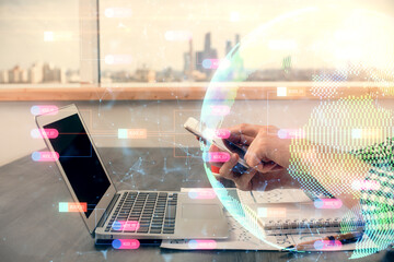 Multi exposure of man's hands holding and using a digital device and map drawing. International...