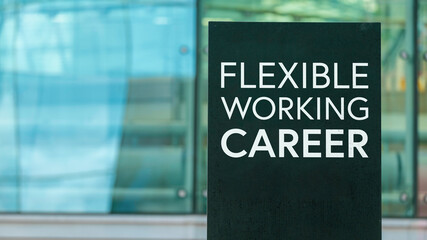 Flexible Working Career on a sign outside a modern glass office building 