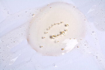 Cosmetic gel product on white background. Texture and background