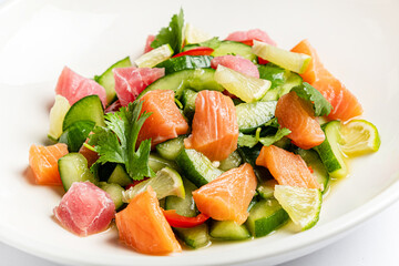 fish salad on the white plate