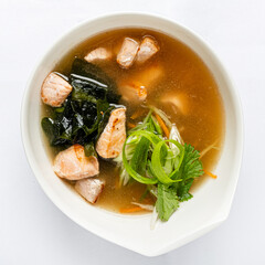 fish soup in the white bowl