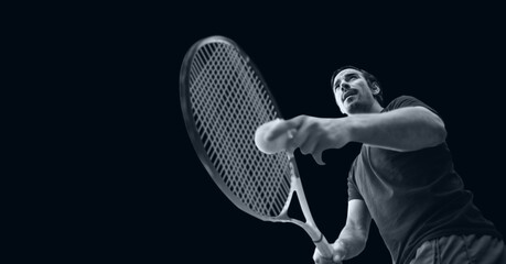Compostion of male tennis player on black background