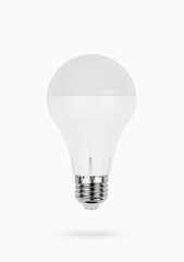 Round white plastic eco glass bulb. Energy saving light bulb isolated on white background.Eco technology.