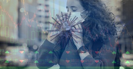 Composition of covid 19 cell and medical data processing over caucasian woman putting face mask on