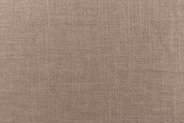 Fototapeta na wymiar smooth surface of linen brown fabric, background, texture