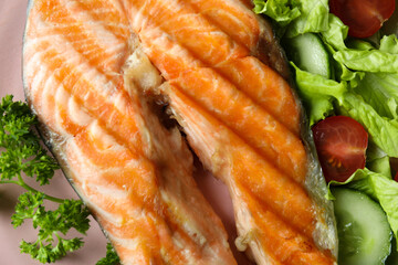 Tasty grilled salmon and ingredients, close up