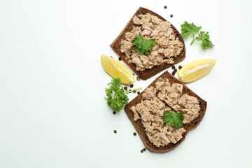 Sandwiches with canned tuna on white background