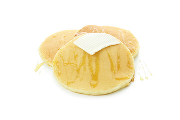 Tasty pancakes with honey and butter isolated on white background