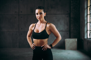 Fototapeta na wymiar female bodybuilder training at the gym