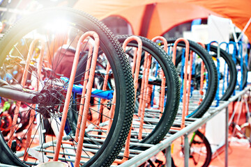 Bicycles on a vertical rack in store