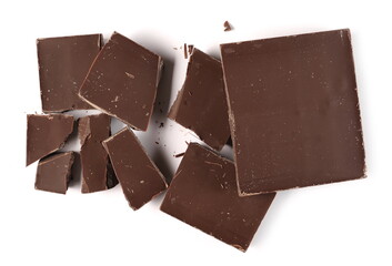 Chocolate bar pieces, chunks isolated on white background, top view