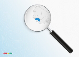 Magnifier with map of Guinea on abstract topographic background.