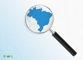 Magnifier with map of Brazil on abstract topographic background.