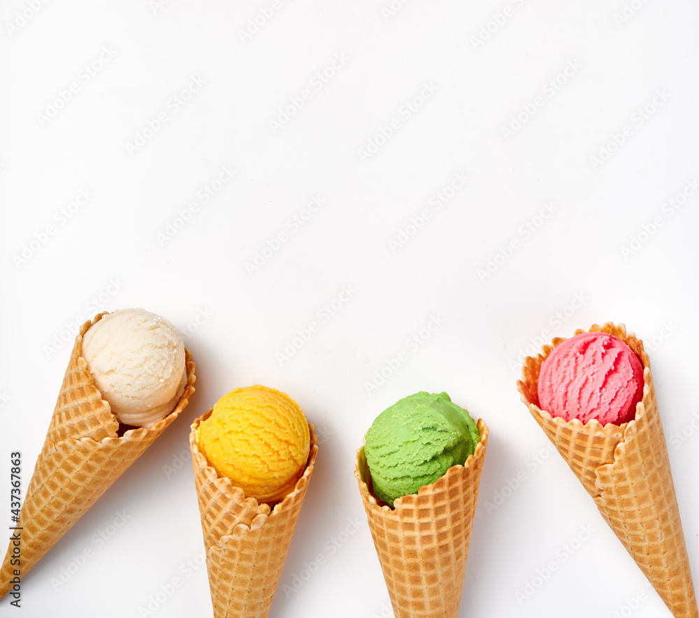 Fototapete assorted of ice cream in cones on white background. colorful set of ice cream of different flavours.