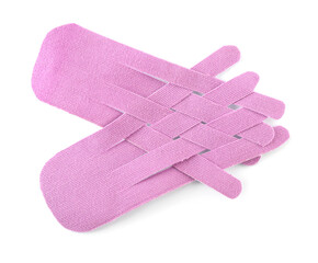 Violet kinesio tape pieces on white background, top view