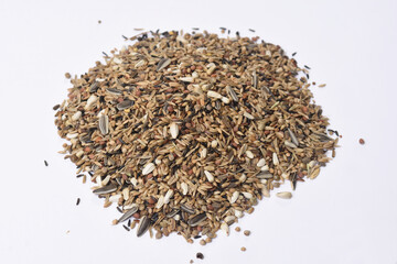 heap of  mixture of grains for  birds type Chloris chloris