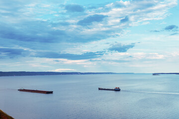 Two cargo ships on the river