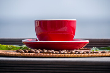 A cup of coffee by the sea.