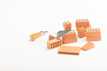 Brown bricks on a white background. Construction Materials