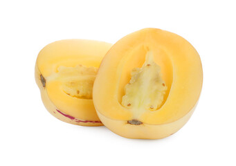 Halves of fresh ripe pepino melon on white background