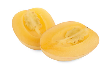 Halves of fresh ripe pepino melon on white background