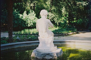 statue of a person in a garden georgia