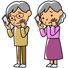 スマートフォンで通話する心配そうな表情の高齢者