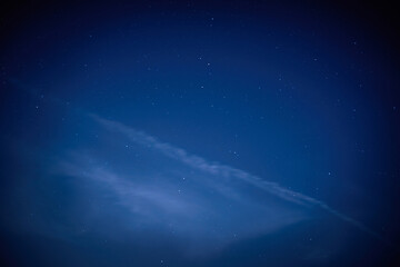 Fototapeta na wymiar Blue dark night sky with many stars. Night sky background
