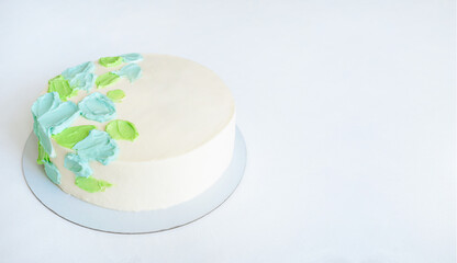 cake with green and blue abstract decor with copy space