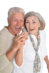 Senior couple with microphone