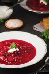 A plate with Ukrainian national dish - borsch