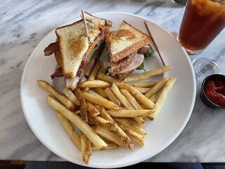 Club sandwich and french fries