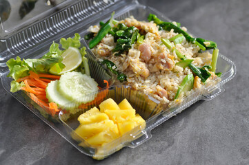 stir fried rice with vegetable and pineapple in the box