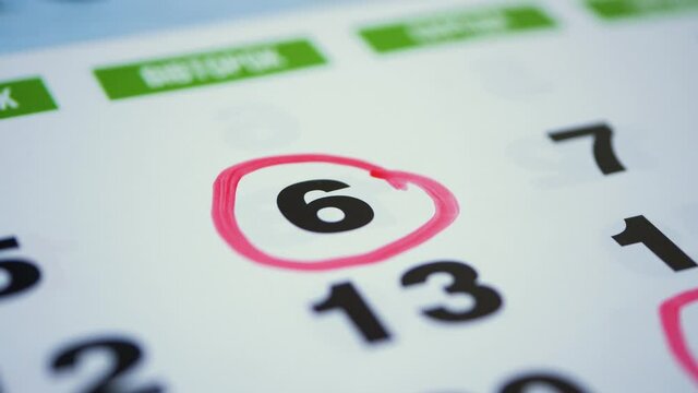 Save the Date written on a calendar 6
