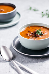 Bean soup with meat, ground paprika and carrot