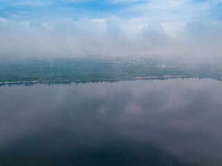 Dnieper River in Kiev. Spring cloudy morning. Aerial drone view.