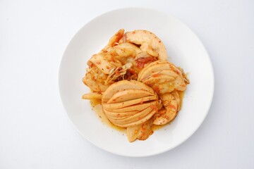 delicious santol salad on a white plate isolated from white background