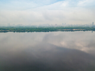 Dnieper River in Kiev. Spring cloudy morning. Aerial drone view.