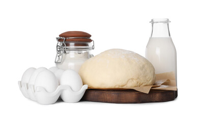 Obraz na płótnie Canvas Natural ingredients and raw dough on white background