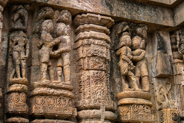 Close up of Kamasutra scenes on the wall of Konark sun temple, Odisha 