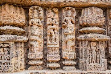 Close up of Kamasutra scenes on the wall of Konark sun temple, Odisha 