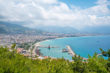Fototapeta premium The scenic view of Red Tower and Alanya Marina from Alanya Castle.