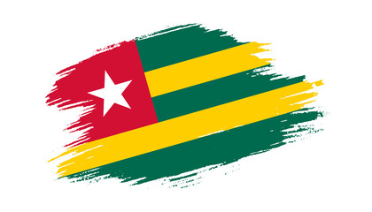 Patriotic of Togo flag in brush stroke effect on white background