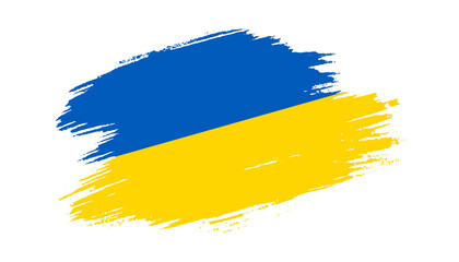Fototapeta Patriotic of Ukraine flag in brush stroke effect on white background obraz