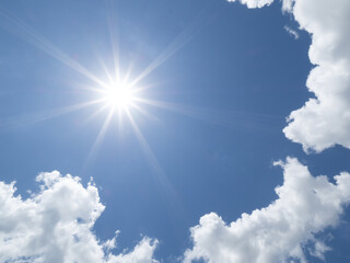 Brillant sun shining in blue sky overhead in southwest Florida USA