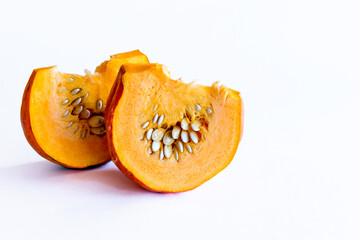 Piece of pumpkin isolated on white background.